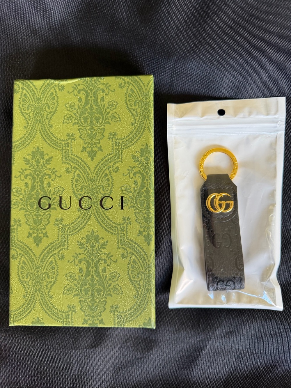 Gucci Black Embossed Leather Key Fob with Gold Double G Ring